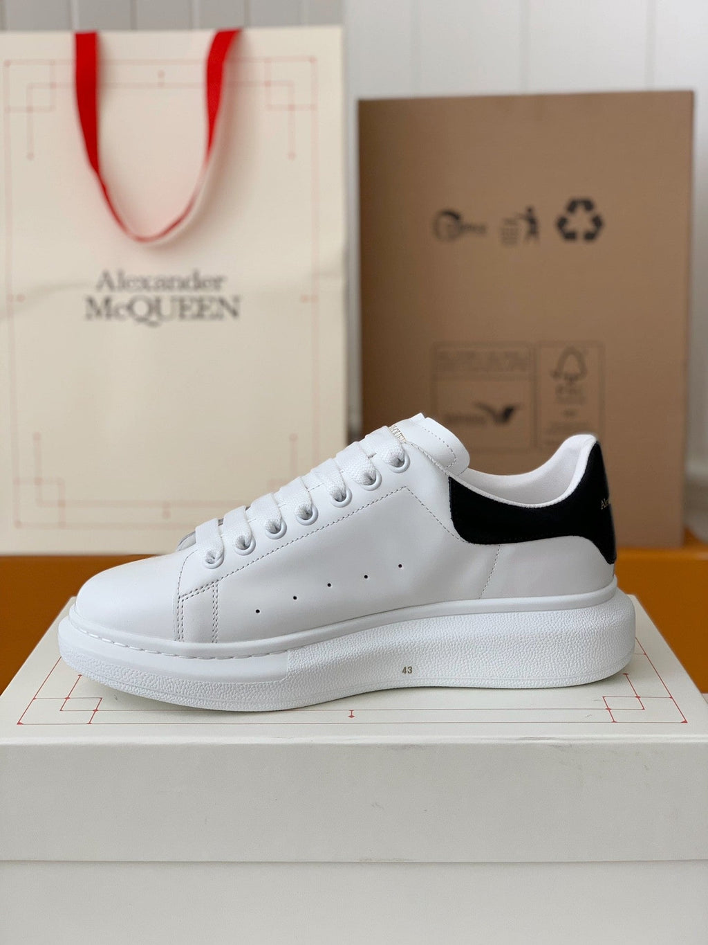 Alexander McQueen Men’s White Leather Oversized Sneakers with Black Heel Tab