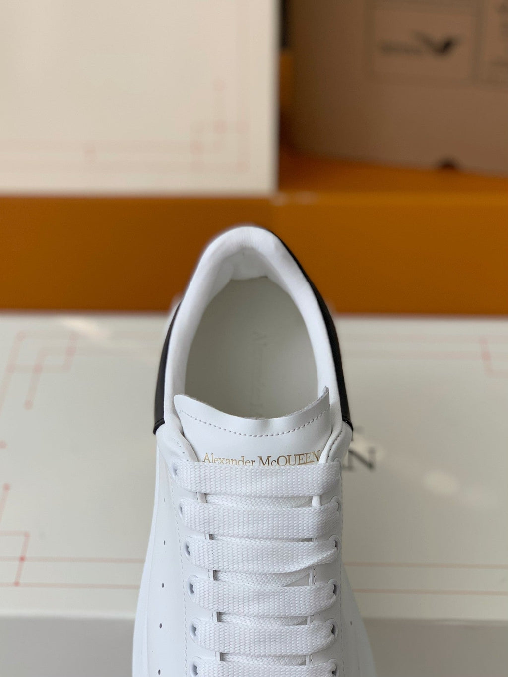 Alexander McQueen Men’s White Leather Oversized Sneakers with Black Heel Tab