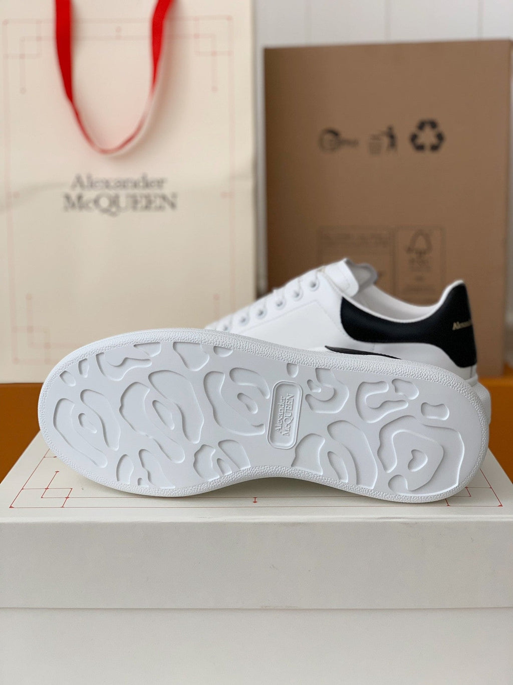 Alexander McQueen Men’s White Leather Oversized Sneakers with Black Heel Tab