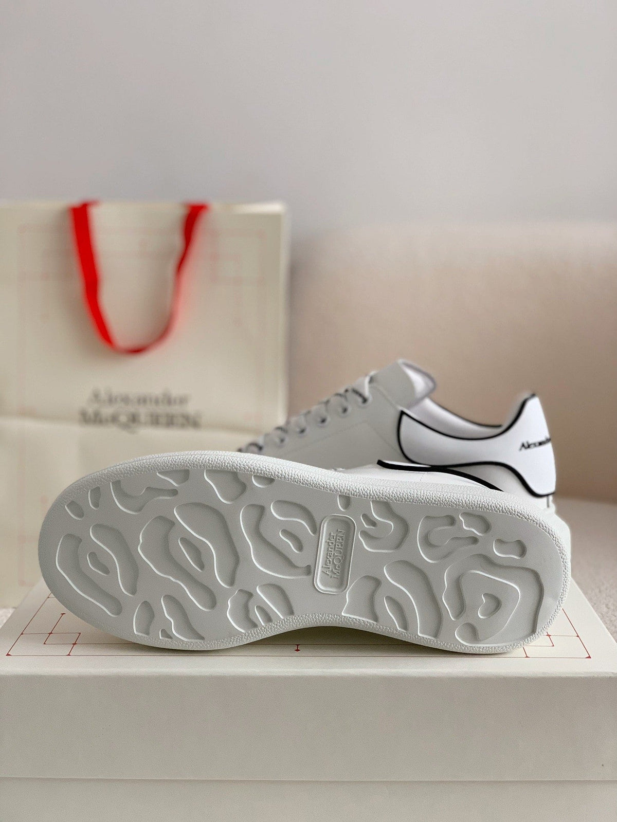 Alexander McQueen Men’s White Leather Oversized Sneakers with Black Piping Detail