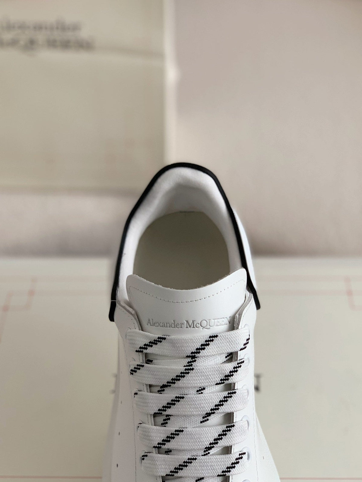 Alexander McQueen Men’s White Leather Oversized Sneakers with Black Piping Detail