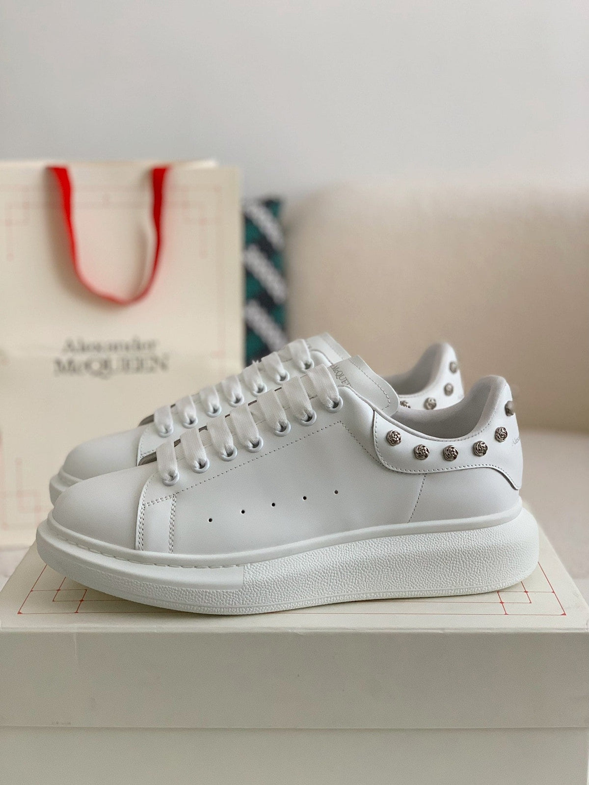 Alexander McQueen Men’s White Leather Oversized Sneakers with Silver Rose Studs