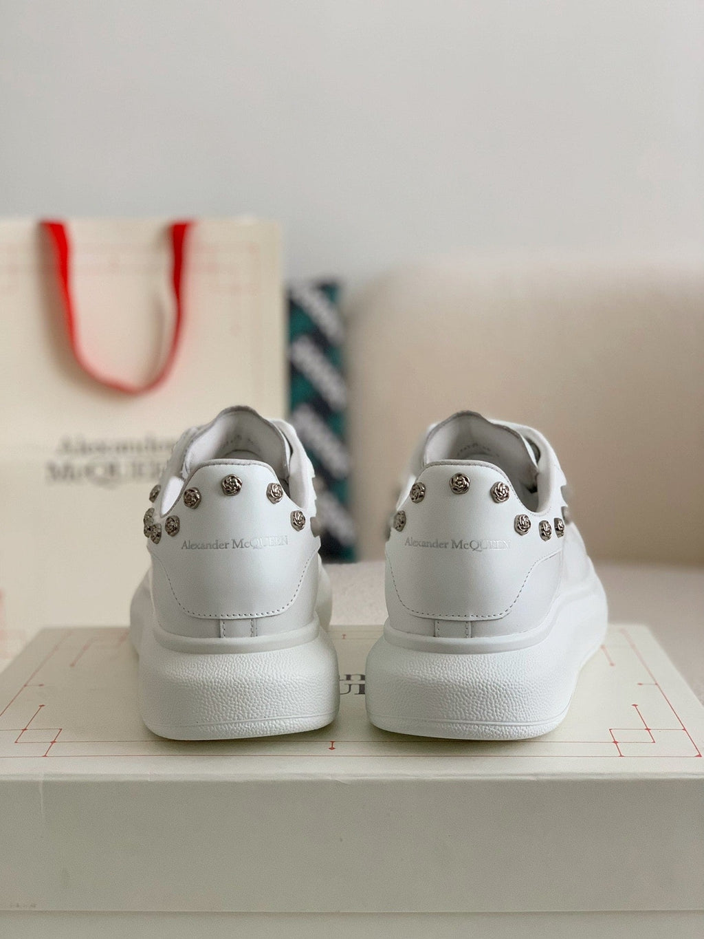 Alexander McQueen Men’s White Leather Oversized Sneakers with Silver Rose Studs