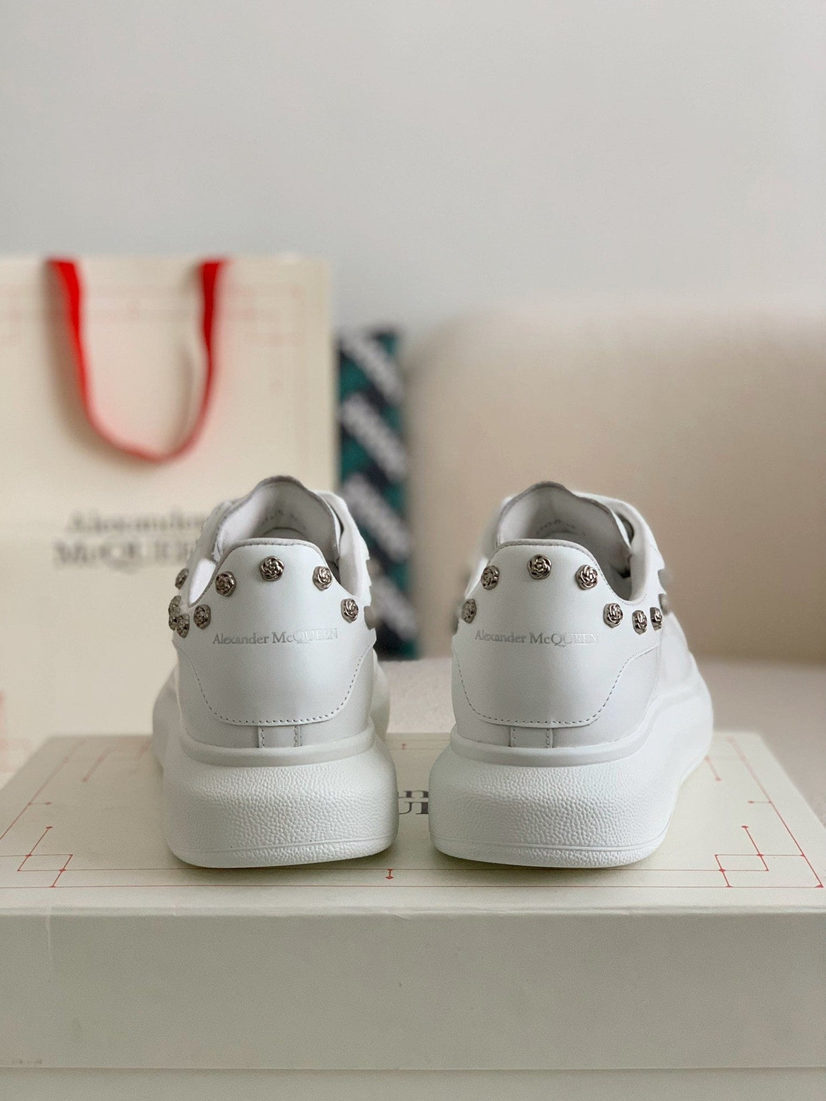 Alexander McQueen Men’s White Leather Oversized Sneakers with Silver Rose Studs