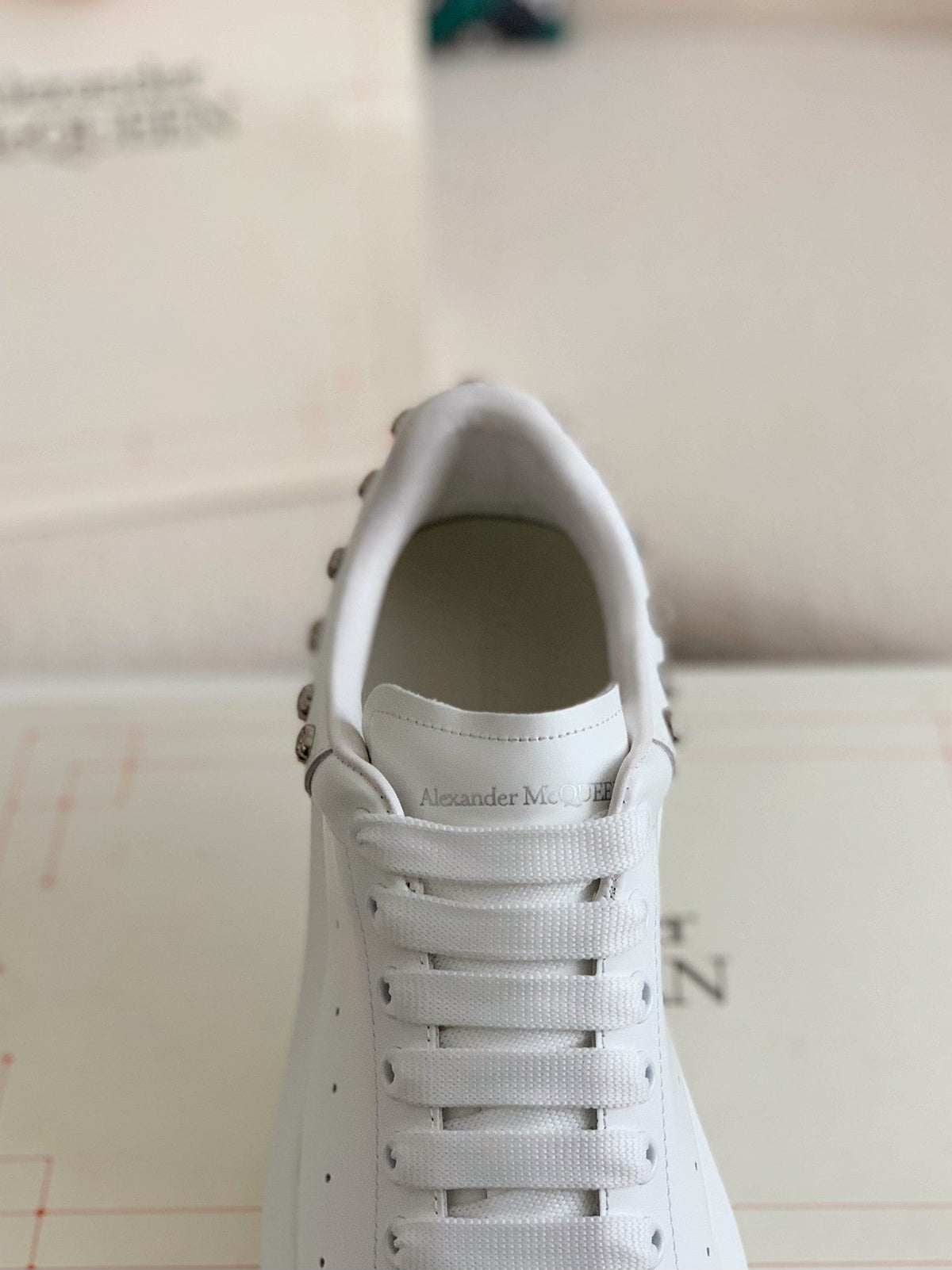 Alexander McQueen Men’s White Leather Oversized Sneakers with Silver Rose Studs