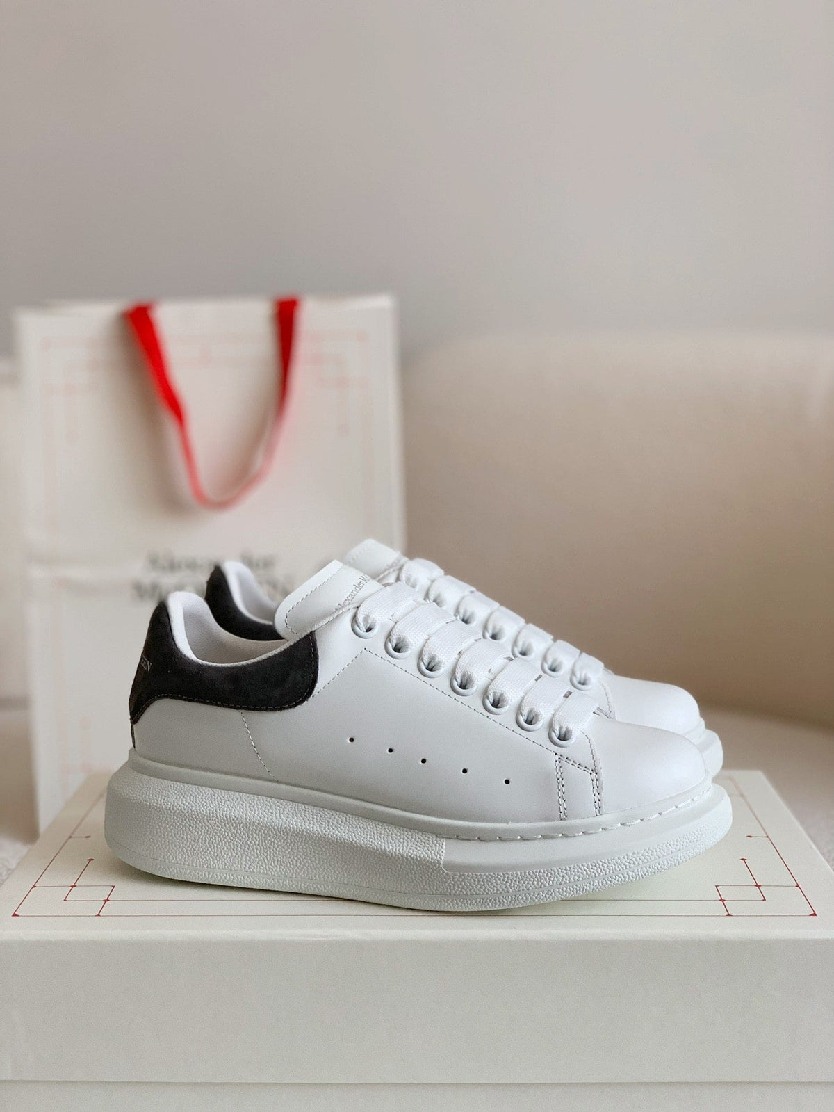Alexander McQueen White Leather Oversized Sneakers with Black Suede Heel Tab