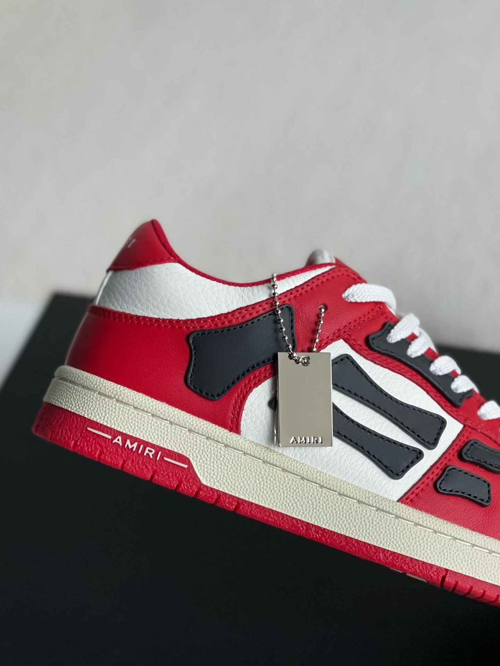 Amiri Skel Top Low – Red, White & Black Grained Leather