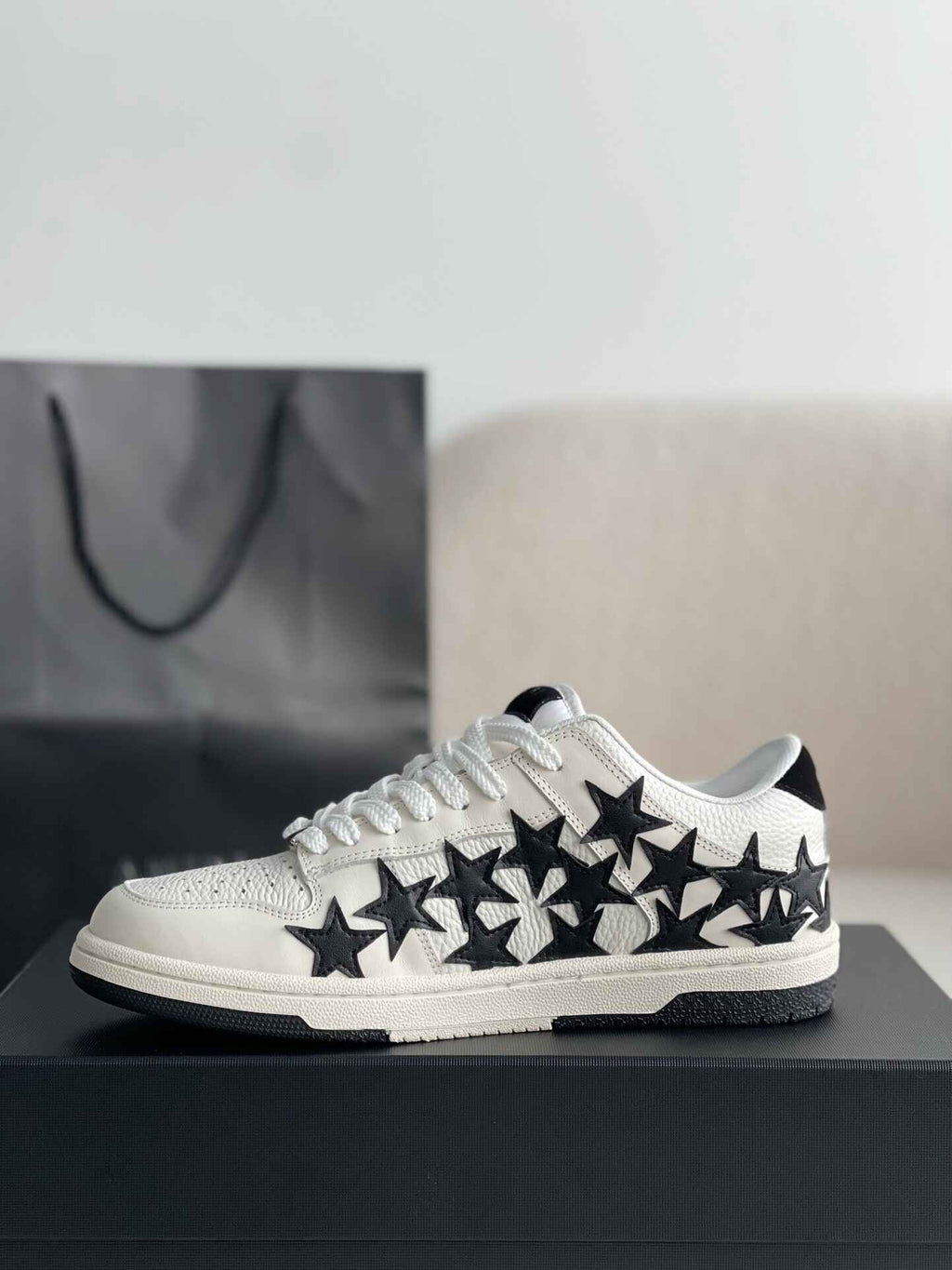 Amiri Star Burst Low – White Grained Leather & Black Stars