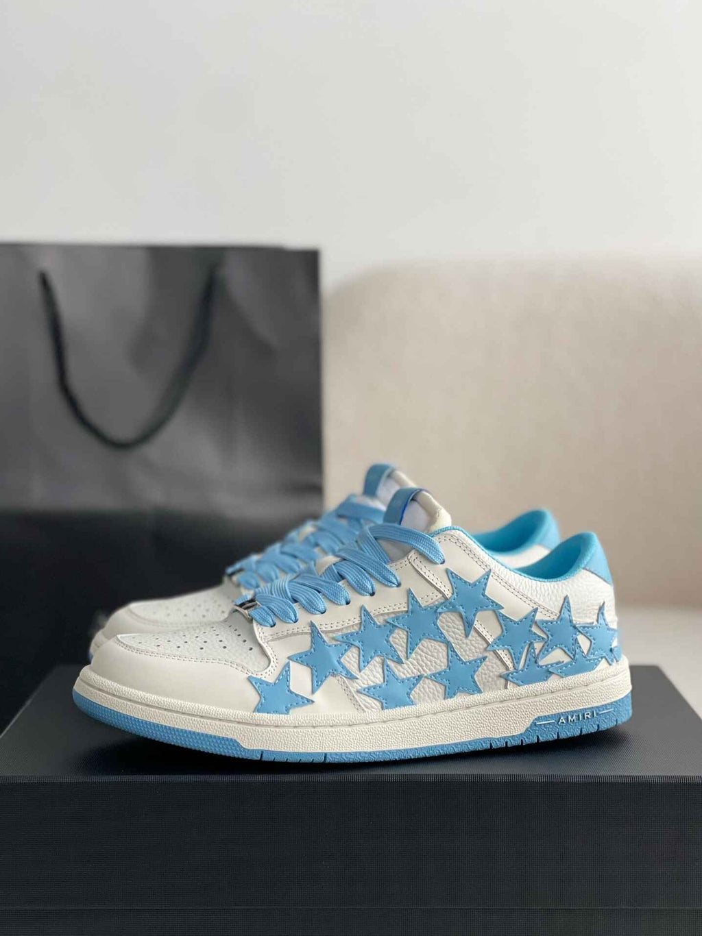 Amiri Star Burst Low – White Grained Leather & Sky Blue Stars