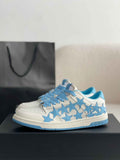Amiri Star Burst Low – White Grained Leather & Sky Blue Stars