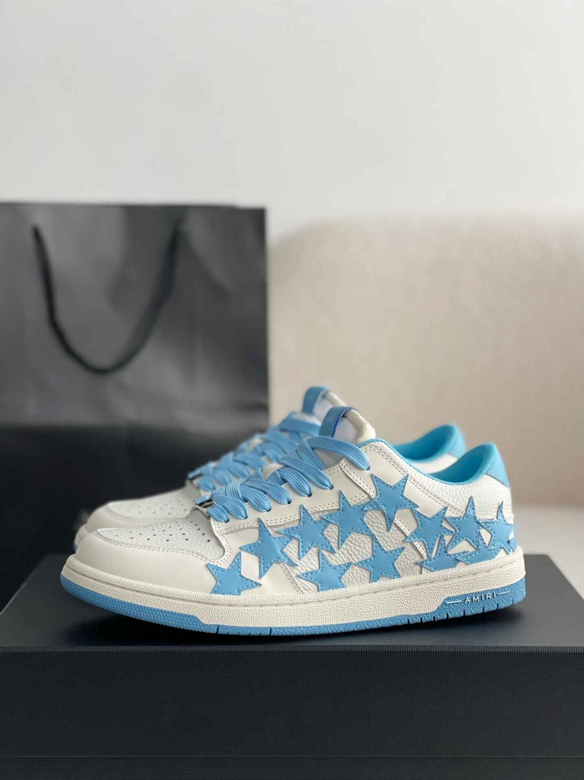 Amiri Star Burst Low – White Grained Leather & Sky Blue Stars