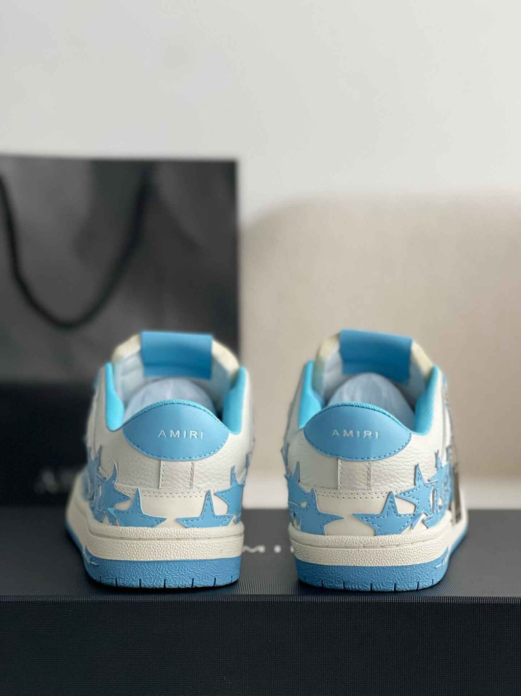 Amiri Star Burst Low – White Grained Leather & Sky Blue Stars
