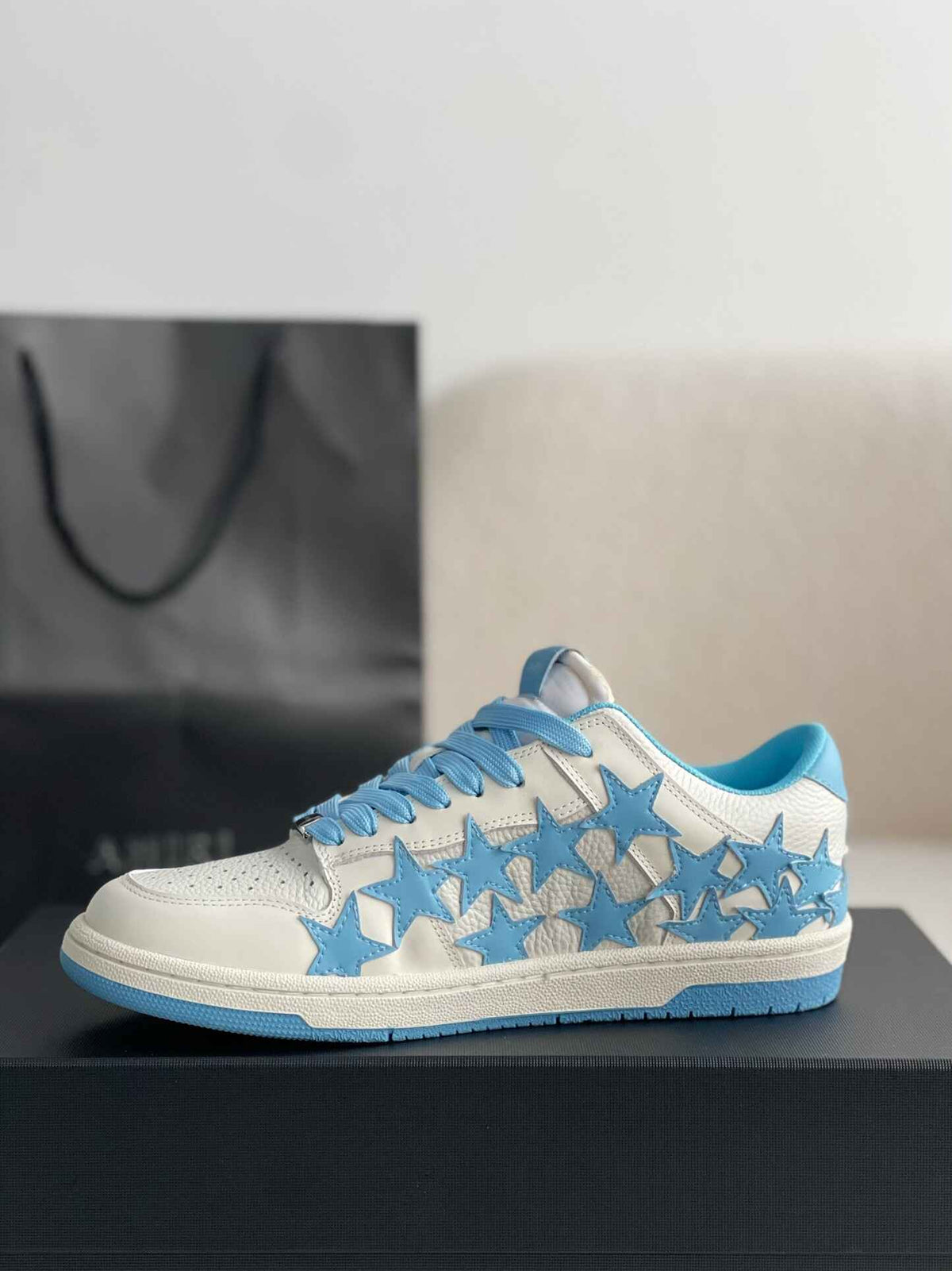 Amiri Star Burst Low – White Grained Leather & Sky Blue Stars