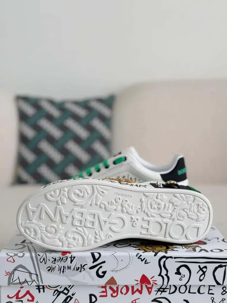 Dolce & Gabbana Portofino Sneaker – White Graffiti, Green Accents & Gold Crest