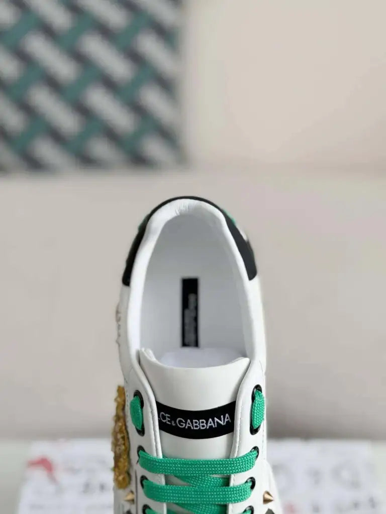Dolce & Gabbana Portofino Sneaker – White Graffiti, Green Accents & Gold Crest