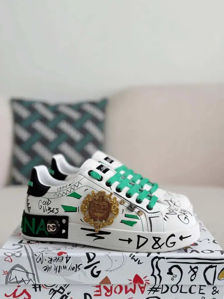 Dolce & Gabbana Portofino Sneaker – White Graffiti, Green Accents & Gold Crest