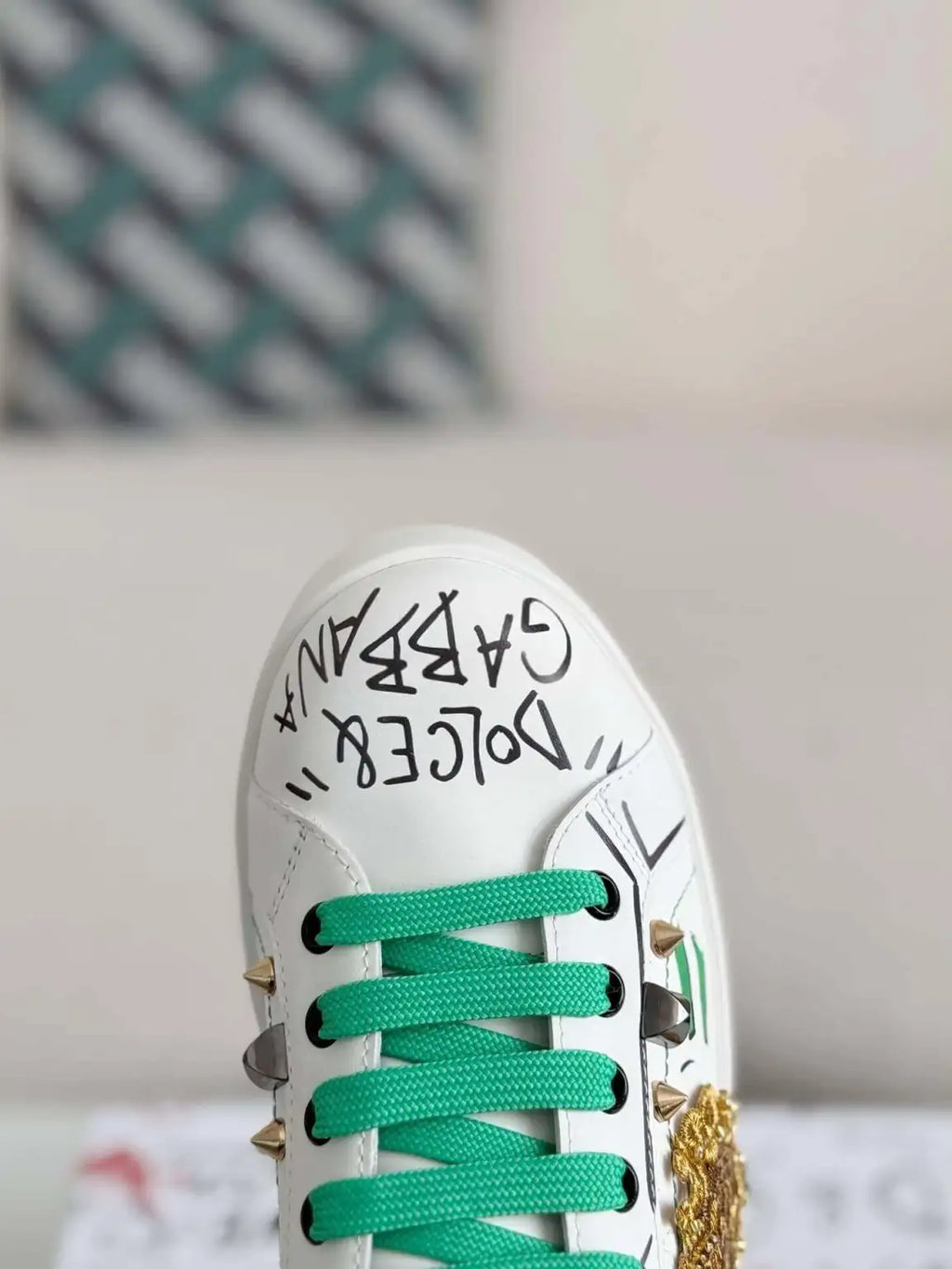Dolce & Gabbana Portofino Sneaker – White Graffiti, Green Accents & Gold Crest