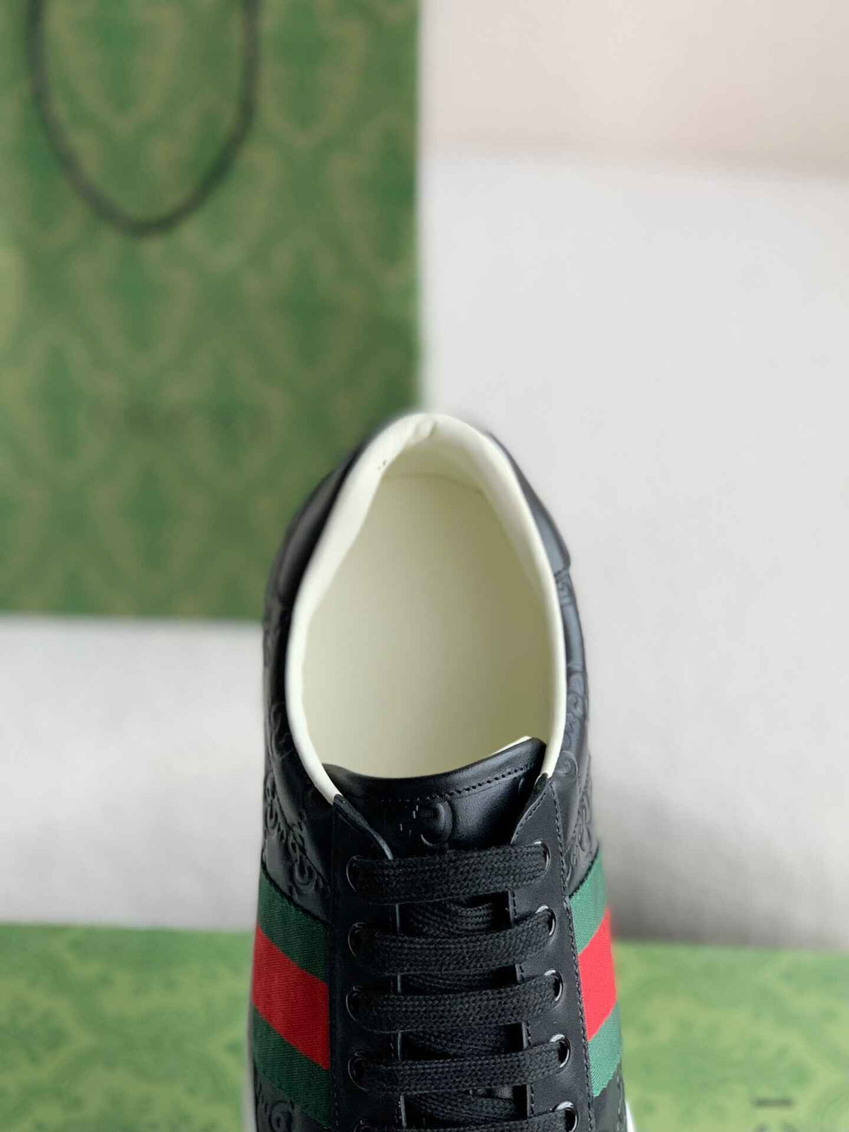 Gucci Ace Sneaker – Black GG Embossed Leather with Green & Red Web