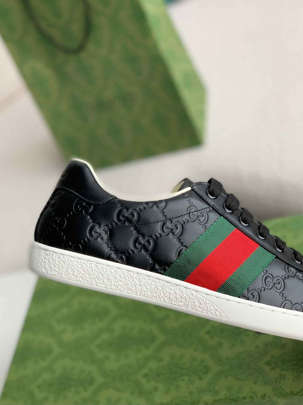 Gucci Ace Sneaker – Black GG Embossed Leather with Green & Red Web