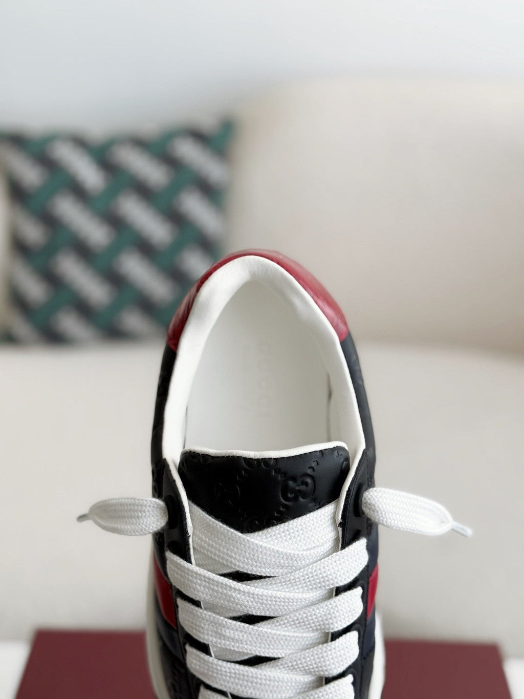Gucci Re-Web Sneaker – Black GG Embossed Leather with Red & Blue Web