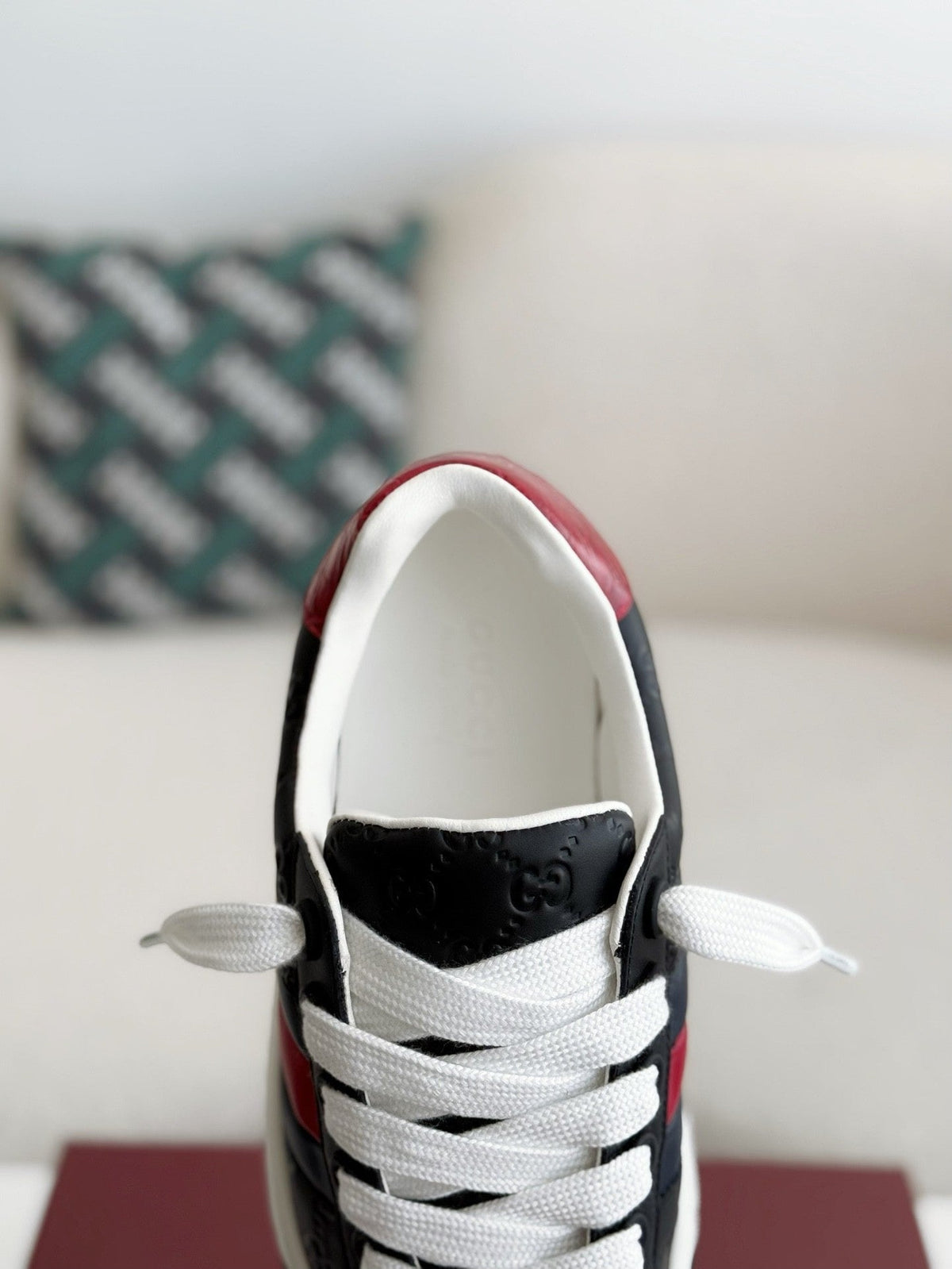 Gucci Re-Web Sneaker – Black GG Embossed Leather with Red & Blue Web