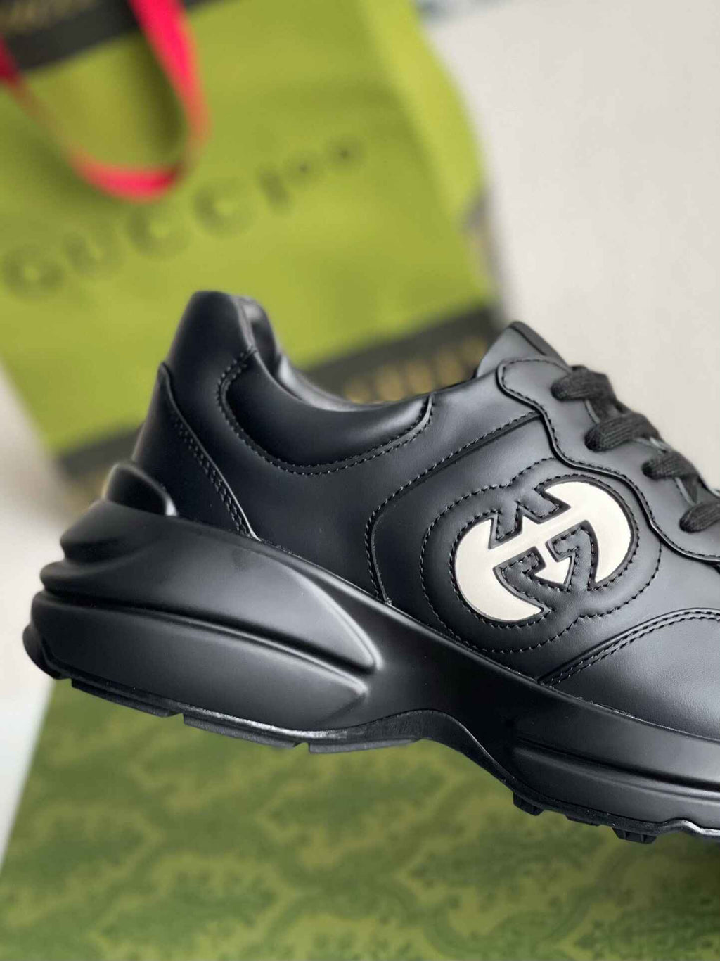 Gucci Rhyton Sneaker – Black Leather with White Interlocking G