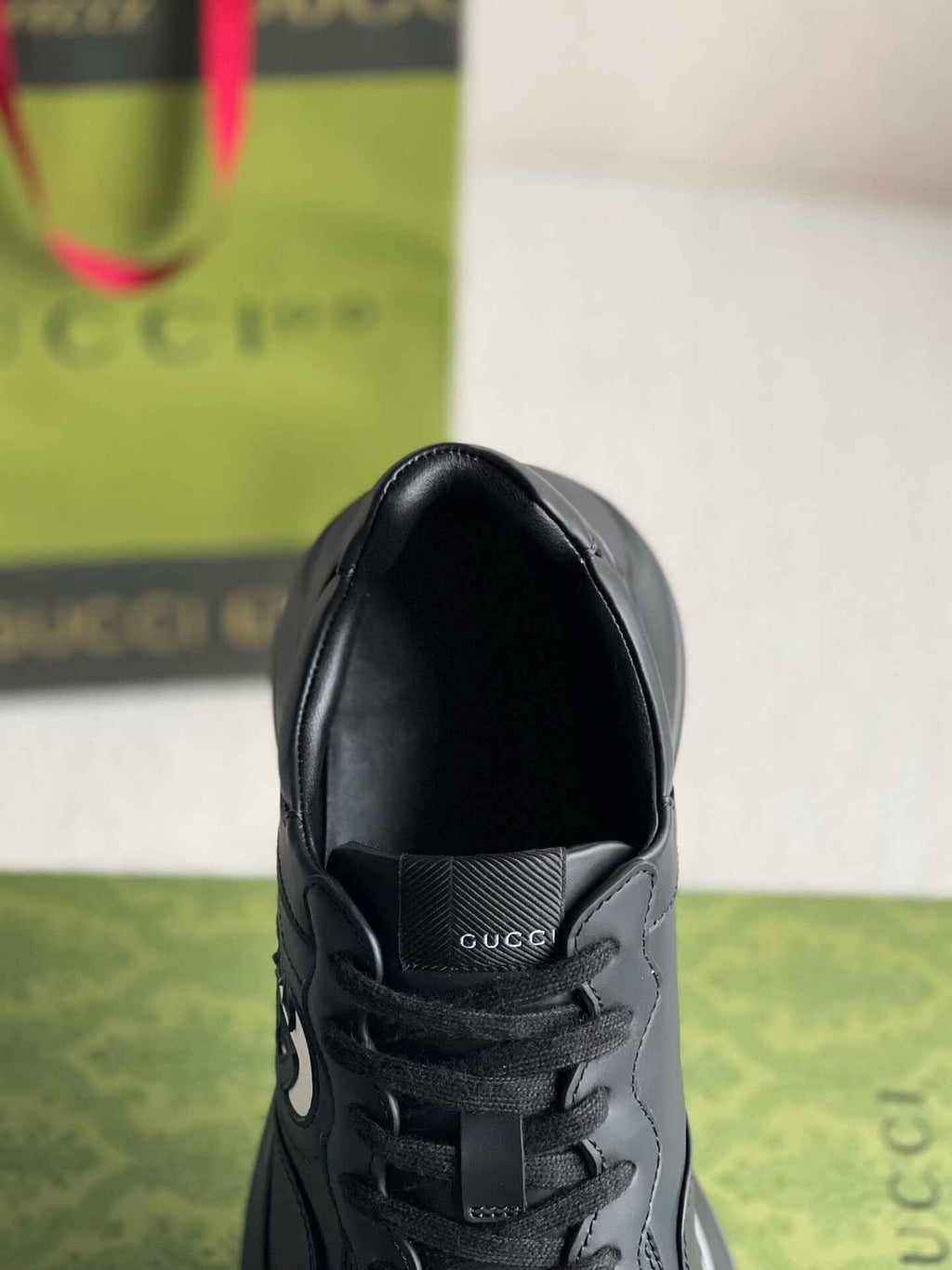 Gucci Rhyton Sneaker – Black Leather with White Interlocking G