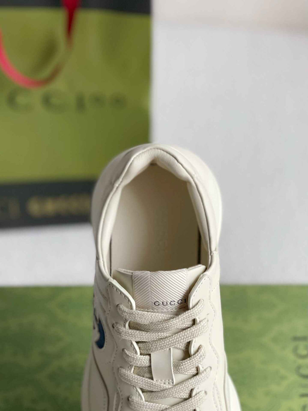 Gucci Rhyton Sneaker – Ivory Leather with Blue Interlocking G