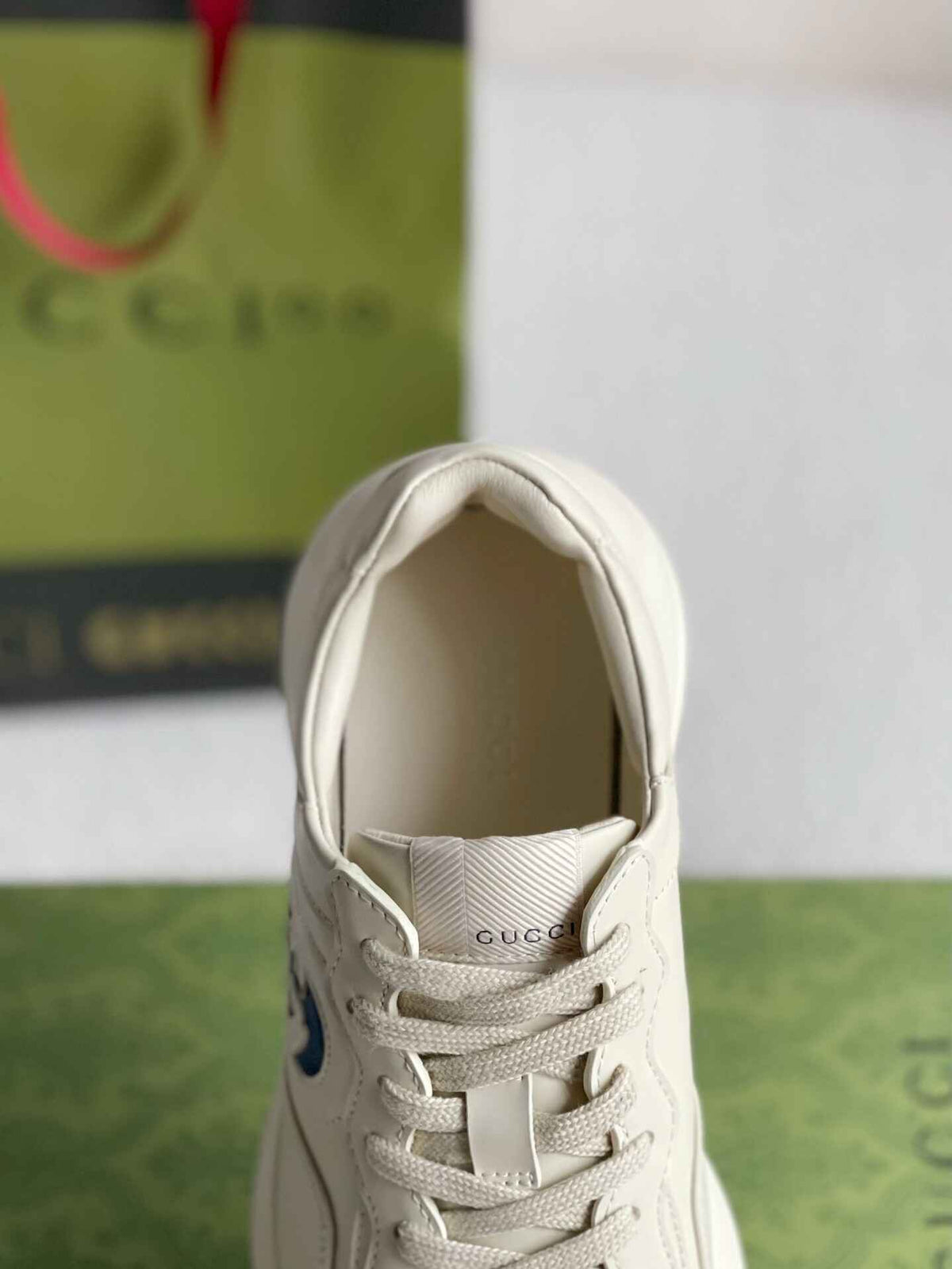 Gucci Rhyton Sneaker – Ivory Leather with Blue Interlocking G