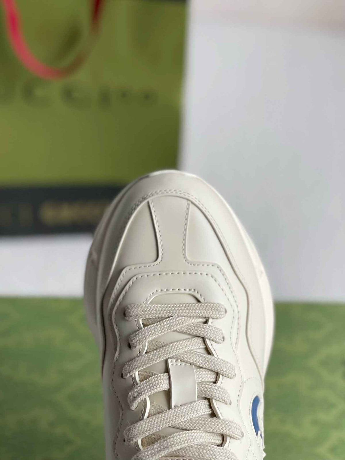 Gucci Rhyton Sneaker – Ivory Leather with Blue Interlocking G
