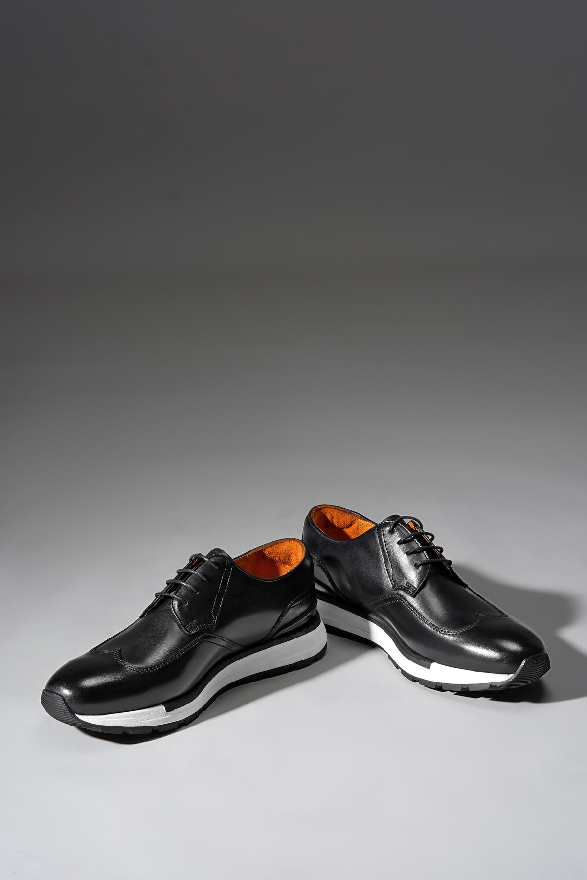 Lido Wingtip Derby Sneaker — Black Leather