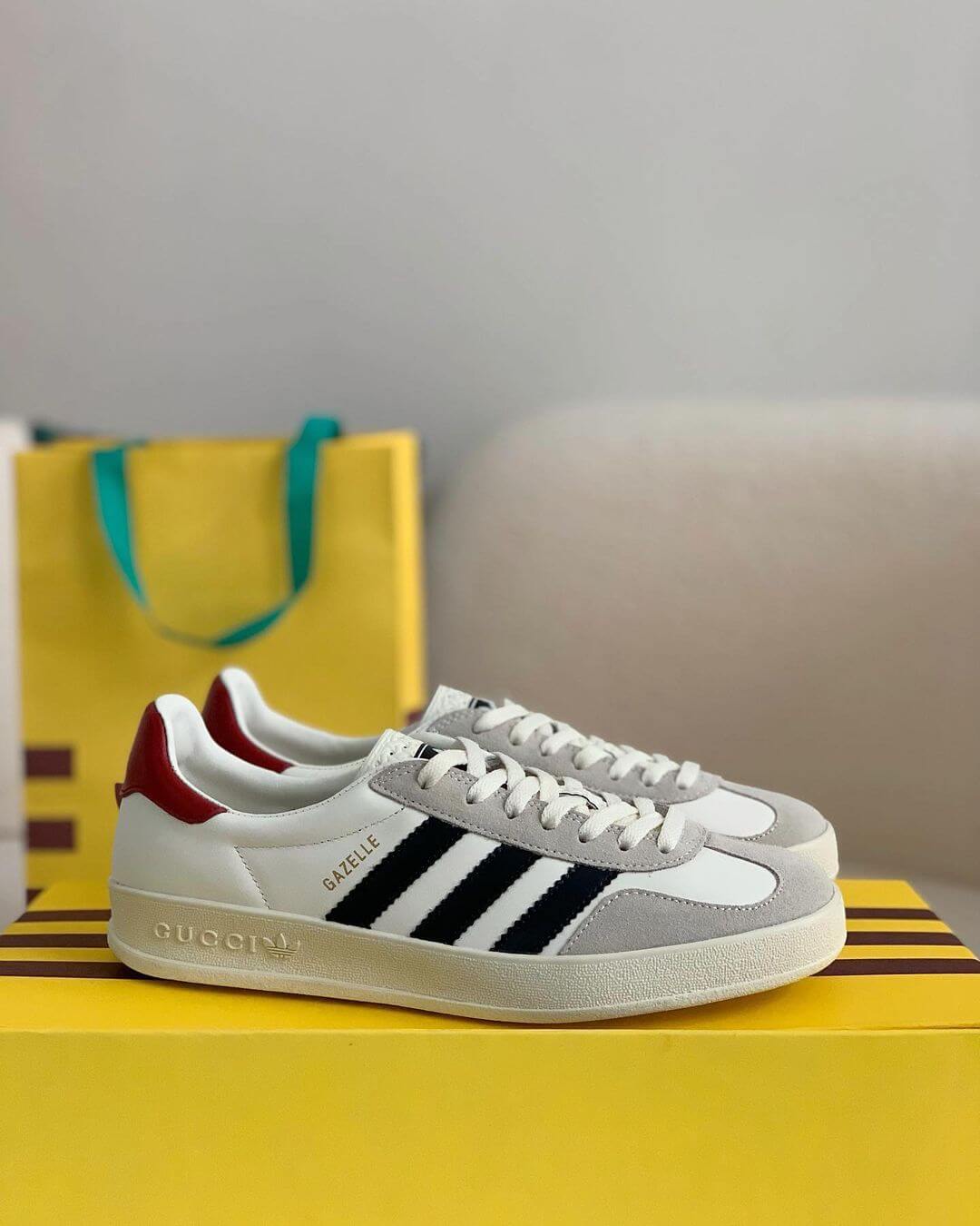 Adidas x Gucci Gazelle Sneaker in White with Black Stripes and Red Heel Tab