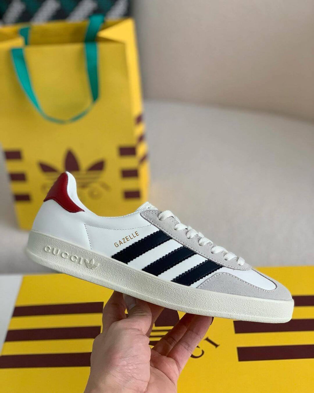 Adidas x Gucci Gazelle Sneaker in White with Black Stripes and Red Heel Tab