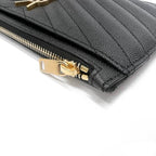 Saint Laurent Clutch Monogram Quilted Textured-leather Black Leather Wristlet
